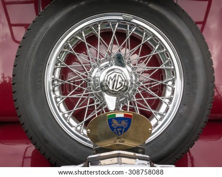 PARMA, ITALY - APRIL 2015: MG Retro Vintage Car Spare Wheel Detail