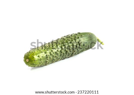 Green, raw cucumber, on white background.