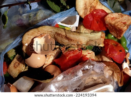 Garbage and food remains in trash bag