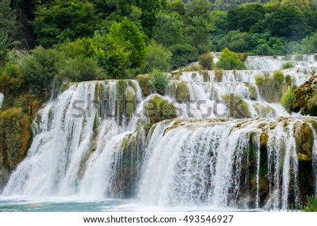 Nature landscape of waterfall cascade in the Croatia. Krka river waterfall is popular travel place in Europe. Beautiful Skradinski Buk Waterfall In Krka National Park