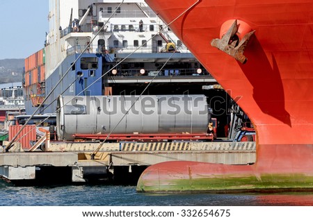 GENOA, ITALY - MARCH 27, 2015: The vessel CHODZIEZ a ro ro cargo ship. Boarding in the commercial port of Genoa in materials and industrial components.