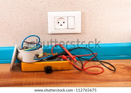 Electrical socket with the switch on the wall and electrical tools