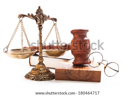 Gavel, vintage bronze scales, book and glasses on a white background