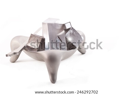 Aluminum bars in a vase on a white background