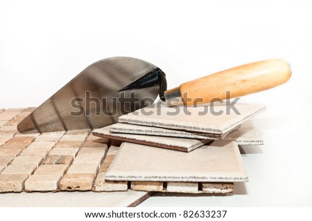 ceramic tiles and trowel for repairs