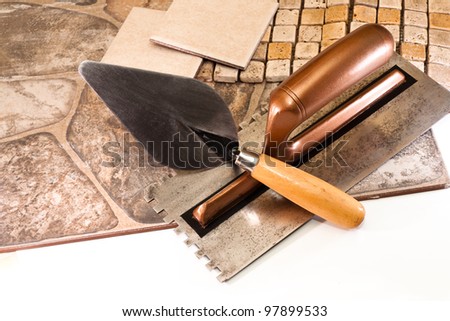 Ceramic tiles, mosaic and stone tool for the job tiler