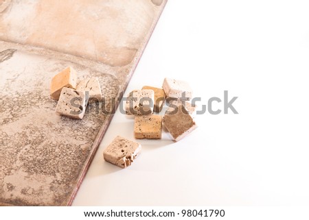 Ceramic tiles and mosaics made of stone on a white background