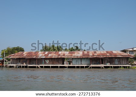BANGKOK, THAILAND - FEBRUARY 14, 2015: Landscape at the River, Waterfront home at Amphawa Floating Market