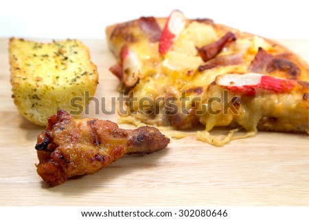 fried chicken and pizza  on wood plate white back ground, Hot Meat Dishes