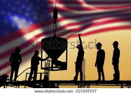 silhouette of construction worker stand on scaffolding  framework casting concrete column  in construction site blur United States flag background