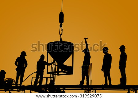 silhouette of construction worker stand on scaffolding framework casting concrete column in construction site during beautiful sunset
