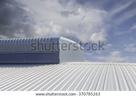 metal sheet  roofing on commercial construction with blue sky