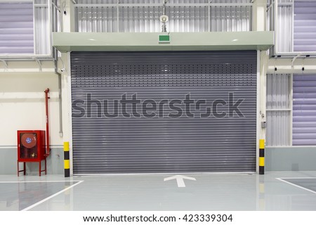 Shutter door or rolling door beige color, in new factory construction site
