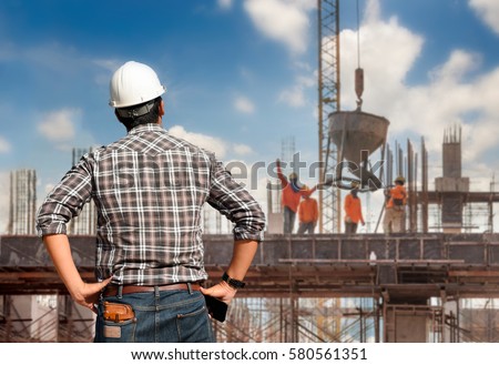 Work Safety officer or Civil Engineer. team worker on background