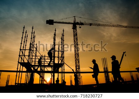 Work Safety officer or Civil Engineer. team worker on background of construction site