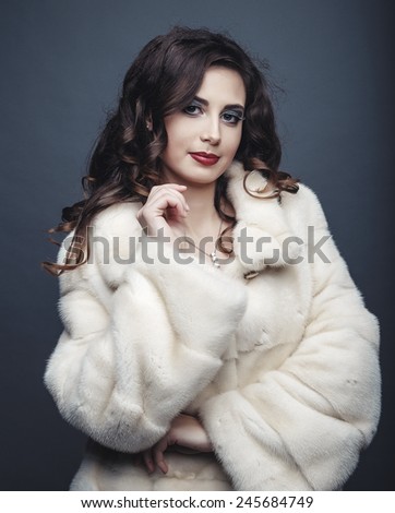 Beauty Fashion Model Girl in Fur Coat. Beautiful Luxury Winter Woman