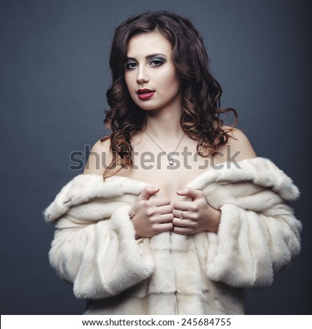 Beauty Fashion Model Girl in Fur Coat. Beautiful Luxury Winter Woman