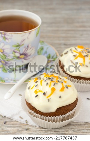Sweet pumpkin cupcakes with cream cheese icing