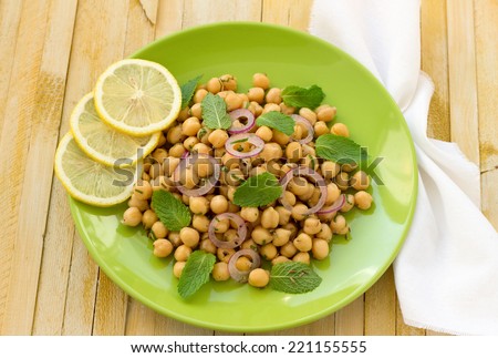 Vegetarian chickpeas salad with mint and spices