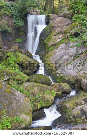 Beautiful forest waterfall. The highest waterfall in Germany.