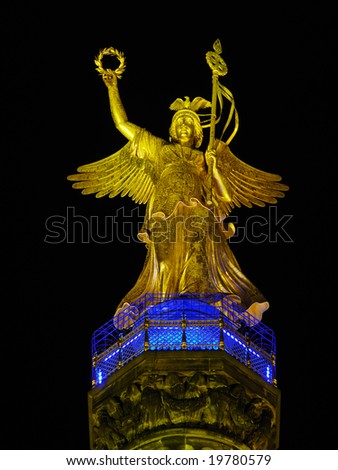 Statue of Angel On Victory Column Siegessaeule in the night, Berlin (Germany)