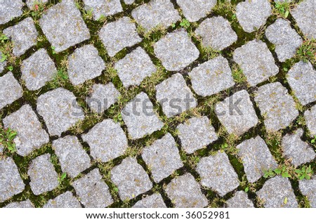 Old cobblestone road. Can be used as background.