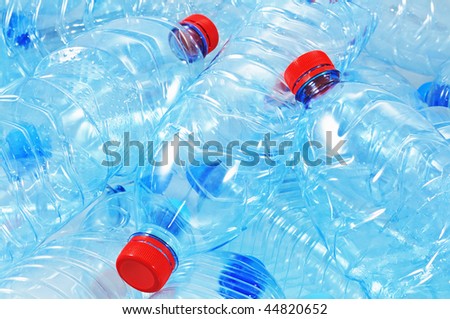 Close up shot of empty plastic bottles for recycling.