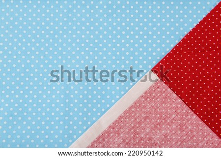 Close up blue cloth with a white circle and red cloth, pattern background
