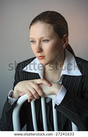 Young sad woman  sit on chair