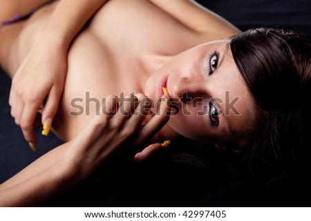 stock photo Perfect nude girl torso On black background