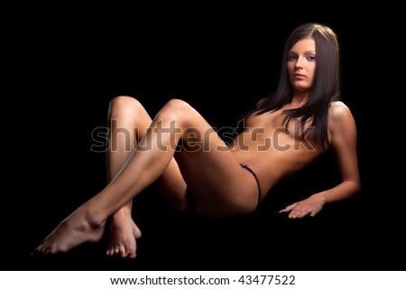 stock photo Perfect nude girl On black background