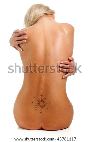 stock photo : Naked woman with back tattoo sit