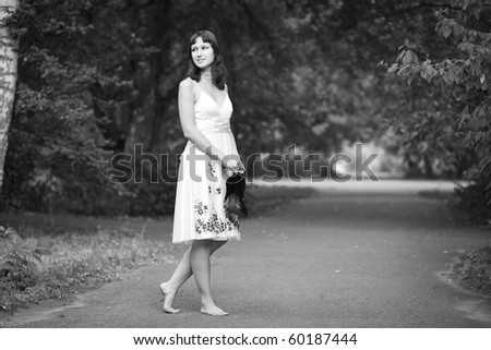 Portrait of naturally beautiful woman in her twenties, shot outside in natural sunlight