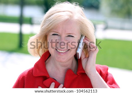 Closeup portrait of senior lady on phone call
