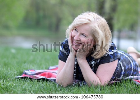 portrait of an elderly woman in the Spring Park