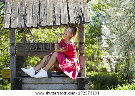 Young woman sitting on the stone steps