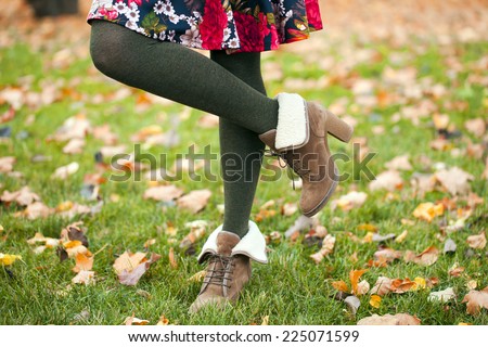 Female wool tights and autumn shoes - body part