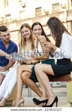 Business team working at laptop in a office outdoor