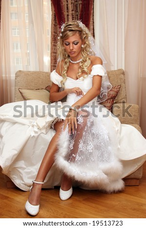stock photo bride sitting wedding dress