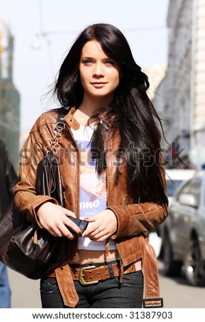 girl in brown a leather to