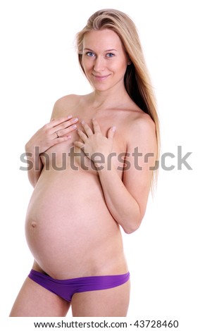 stock photo undressed pregnant female holding her breasts