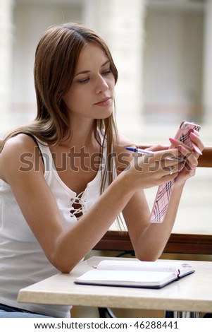 woman reading emails on mobile phone. Copy space