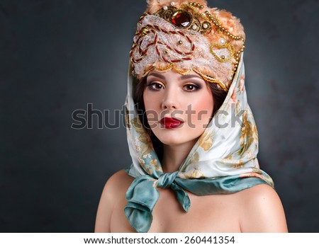 fashion art girl in royal dress. sexy girl in royal hat . Luxury woman in traditional dress