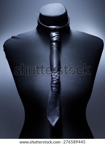 Leather tie necklace with chain on model  in cool light
