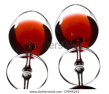 two glasses of wine. stock photo : two glasses of wine reflected in mirror