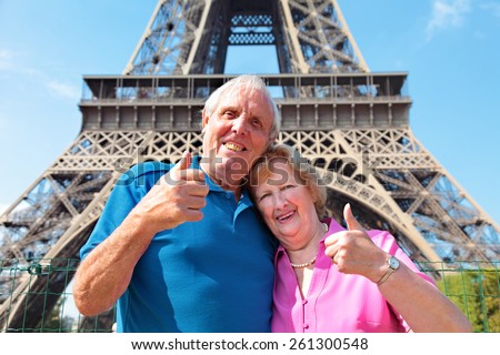 Senior couple with Eiffel Tower in Paris