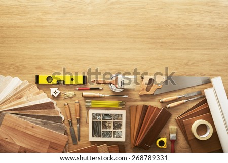 DIY workbench top view with carpentry and construction tools, copy space at top