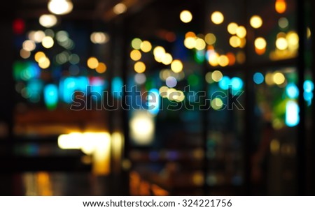 blur blue light in pub at night background