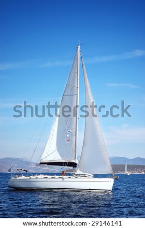 white yacht sail in the sea