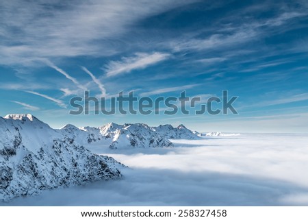 Mountains over a sea of clouds.